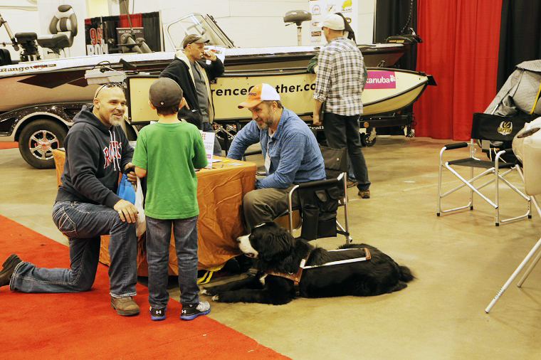 Blue Fish Canada exhibit table at the Toronto Sportsman Show