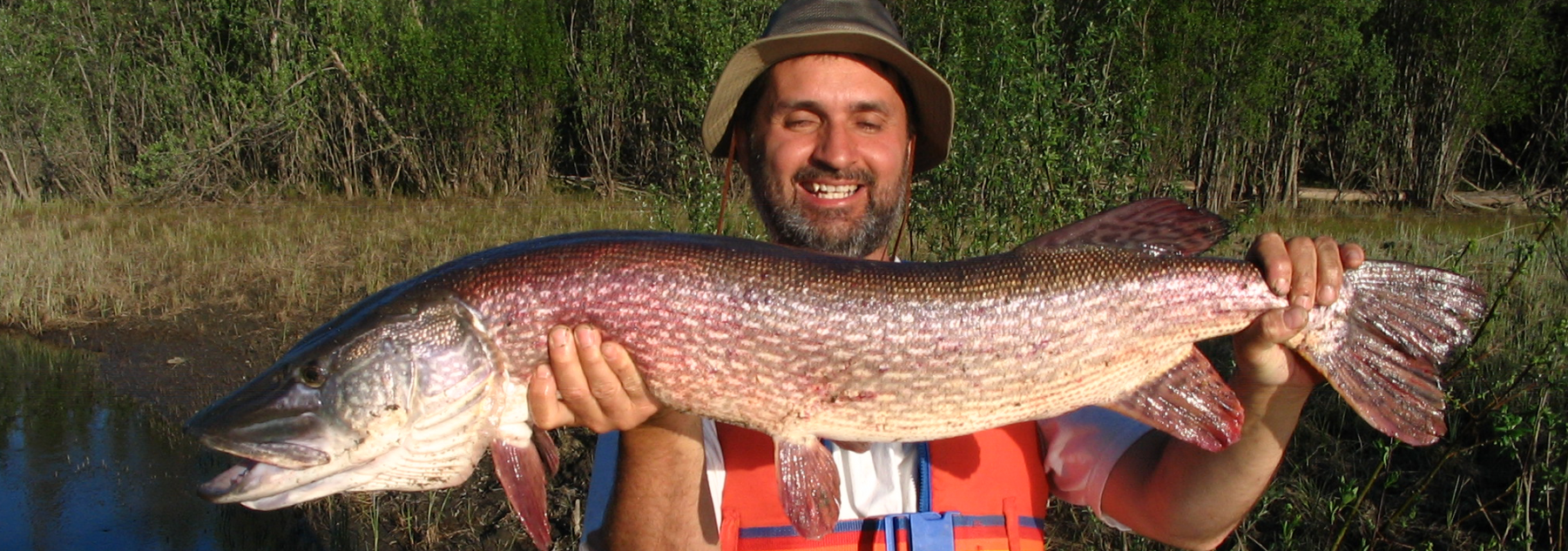 Lawrence holding his catch of a 26lb pike
