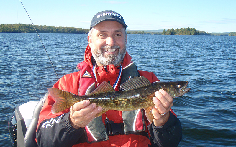 Photo of  Editor Lawrence Gunther fishing walleye